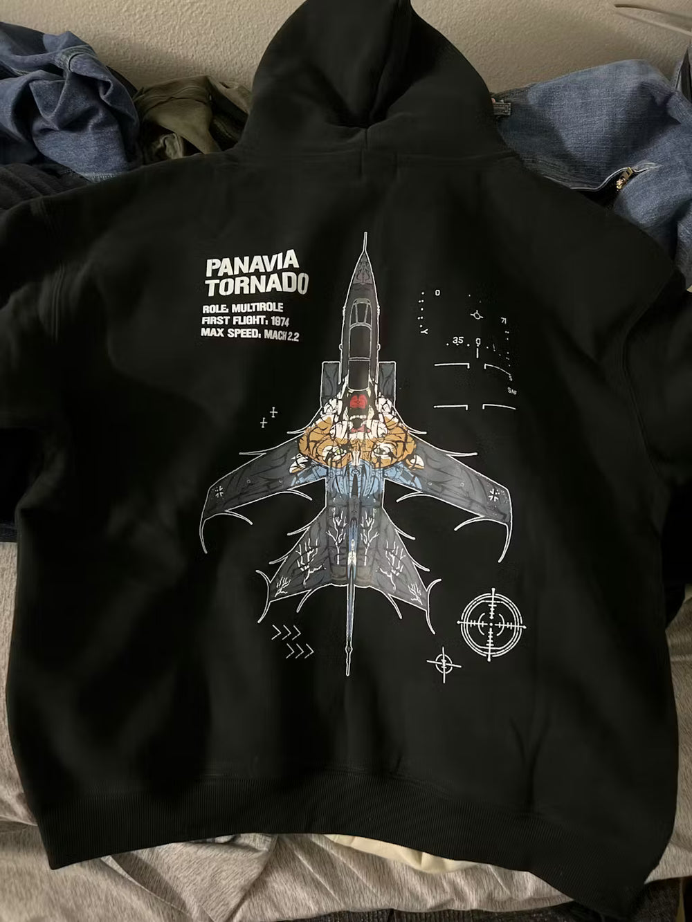 Black hoodie with Panavia Tornado jet graphic, aviation text, and tactical line designs on back