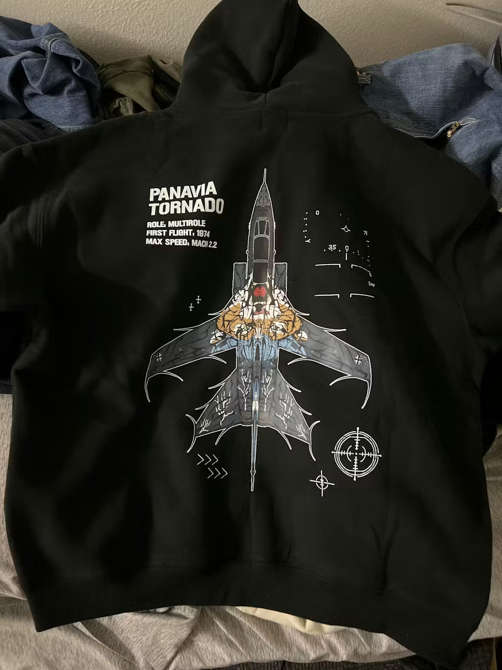 Black hoodie with Panavia Tornado jet graphic, aviation text, and tactical line designs on back