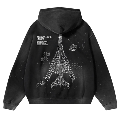 Black hoodie with aviation-inspired Rockwell B-1B Lancer bomber graphic and schematic art