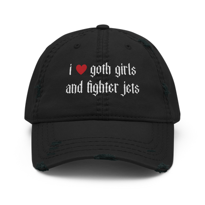 Black distressed dad hat with white gothic text 'i love goth girls and fighter jets' on front