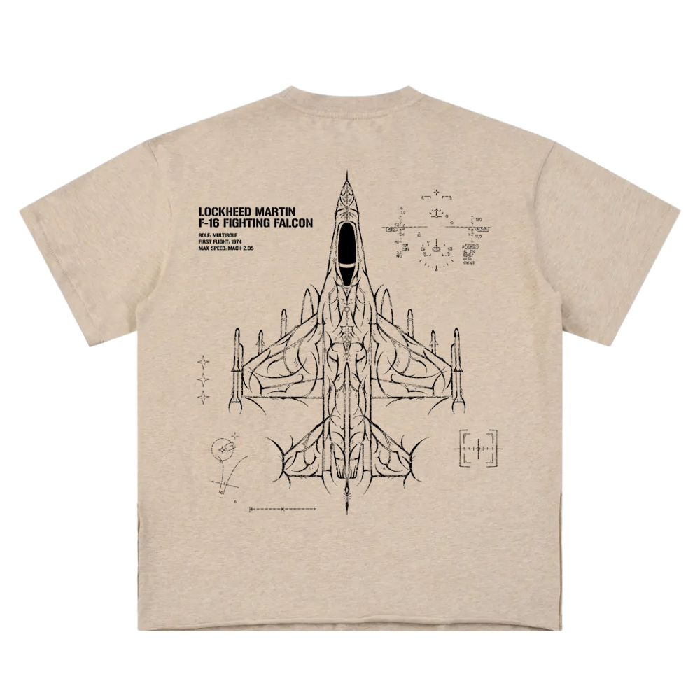 Tan t-shirt with black line art of an F-16 jet, cockpit display graphics, and technical text on back.