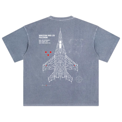 Blue t-shirt with white MiG-29 fighter jet schematic, red stars, and technical text on back
