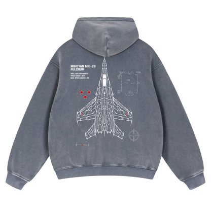 Blue hoodie with white MiG-29 fighter jet graphic, red stars, and technical line art on back.