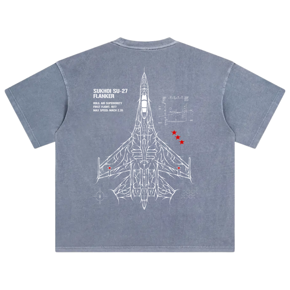 Blue t-shirt with white Sukhoi Su-27 fighter jet blueprint graphic and red stars on back.