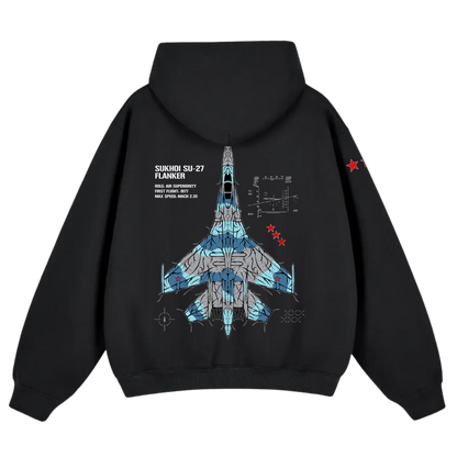 Black hoodie with blue Sukhoi SU-27 fighter jet graphic and aviation technical details on back.