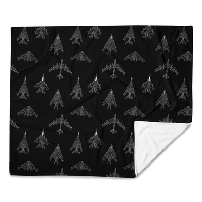 Black throw blanket with white aviation-inspired military jet line art pattern